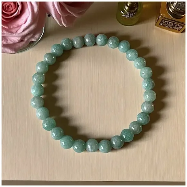 Amazonit krystalarmb�nd � 7 mm perler | St�tter sandhed, ro &amp; balance