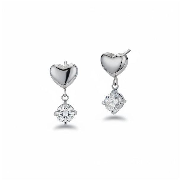 Smukke fors�lvede �restikker med vedh�ng � hjerte og rhinsten i spirituelt design