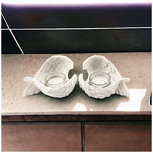 Fyrfadsstager med englevinger