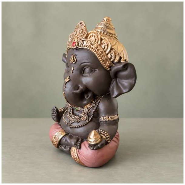 Spirituel Ganesha pyntefigur i klassisk �stlig stil, perfekt som dekoration til stuen, yoga eller meditation. Denne figur vises med siden til.