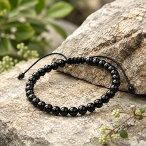 Justerbart sort onyx armb�nd med 6 mm �gte stenperler p� naturlig sten