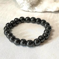 Krystal armb�nd i h�matit med 10 mm stenperler,  M�l 17 - 20 cm