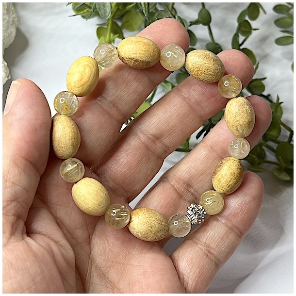 Krystal armbnd m. Guldrutil kvarts, palo santo og charm