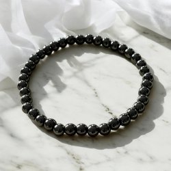 Krystal armbnd i hmatit med 5 mm stenperler,  Ml 16,5 - 19 cm