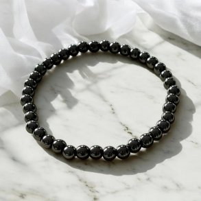 Krystal armbnd i hmatit med 5 mm stenperler,  Ml 16,5 - 19 cm