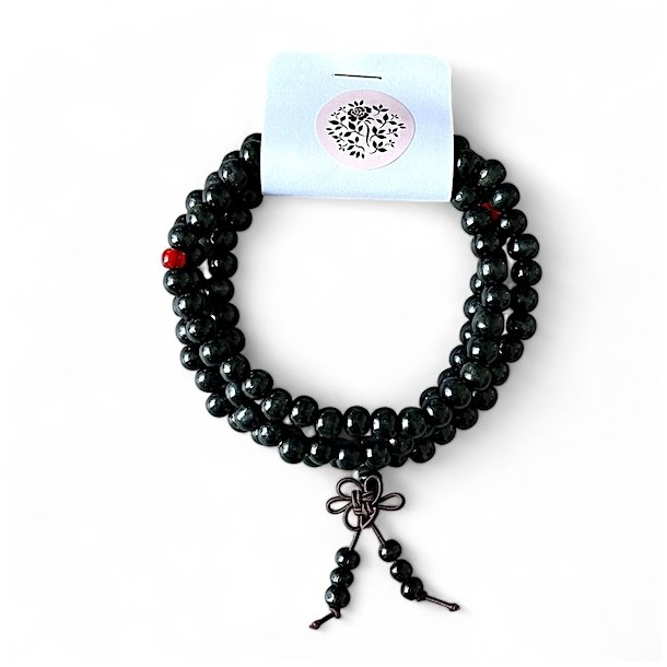 Malakde i sort rosentr  108 perler, lngde 2 x 35 cm