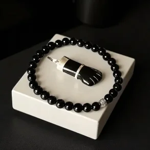 Beskyttende smykkest i sort turmalin med armbnd 17-20 cm og higa vedhng