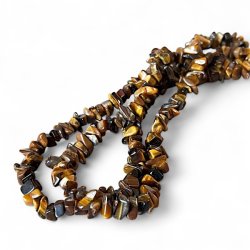 Elegant halskde med Tigerje  76 cm i lngde