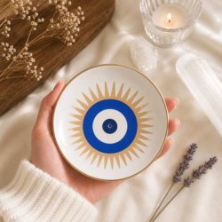 Keramisk r�gelsesholder med tyrkisk �je viser st�rrelse og elegante gulddetaljer