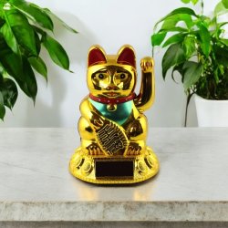 Guldfarvet Maneki Neko  symbolet p held, rigdom og god energi.