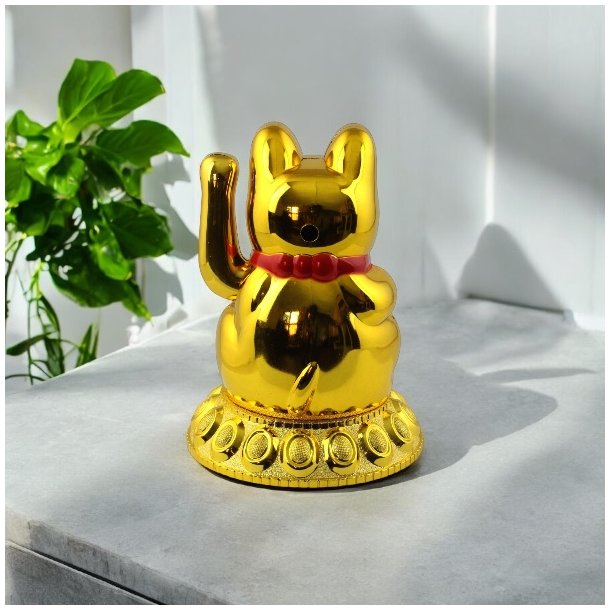 Guldfarvet Maneki Neko  symbolet p held, rigdom og god energi.